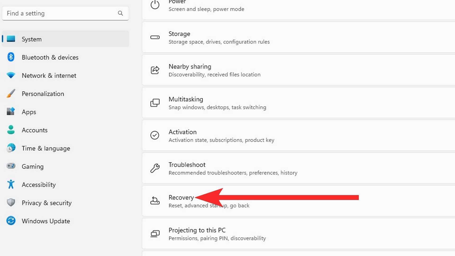 Click on "Recovery" in the System Settings. (Image via Sportskeeda)